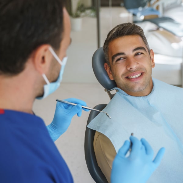 Smiling patient before the procedure